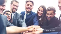 A group taking part in a group handshake