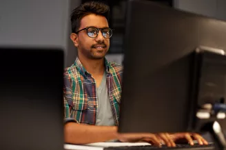 man working at computer